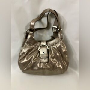Coach champagne Handbag.